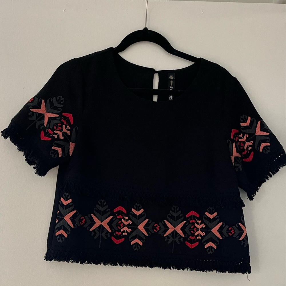 Embroidered Black Top with Pink Accents